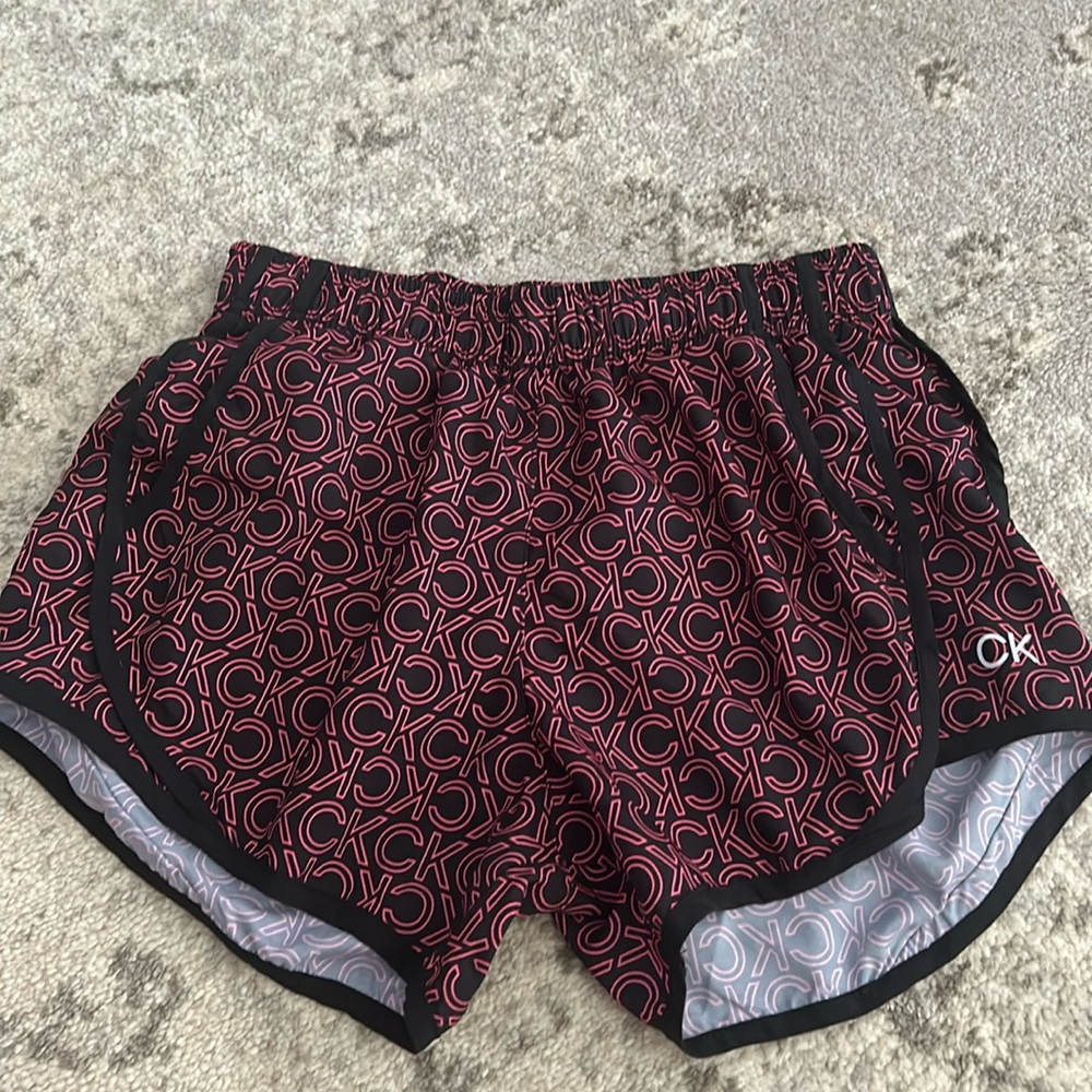 Calvin Klein shorts. Size xs adult. Pink and black.